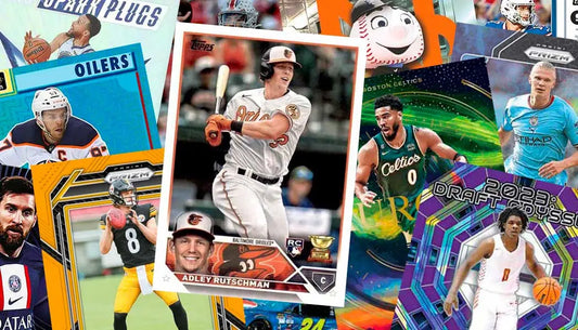 Collection of sports trading cards featuring baseball, basketball, and hockey players.