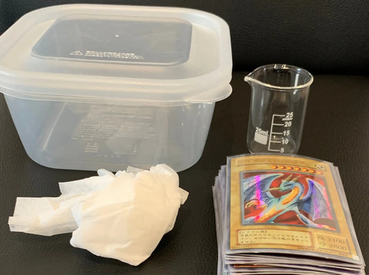 Clear plastic storage container for safely organizing damaged trading cards and vanity slabs